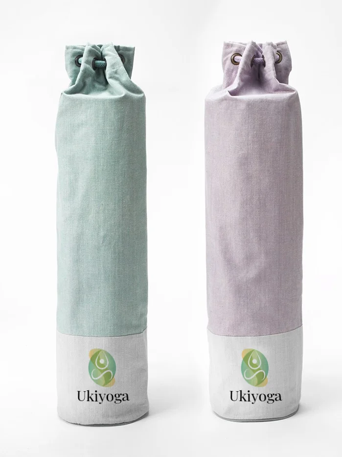 Due borse per tappetino da yoga, verde e lilla, con il logo Ukiyoga